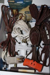lot 272 image: Extension cords and multi plugs