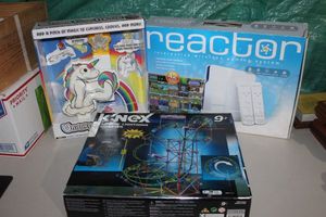 lot 23 image: Knex, Unicorn poop maker and Reactor Interactive Wireless gaming System all SIP