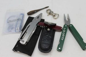 lot 344 image: Multiple Multi tools and Pocket Knife