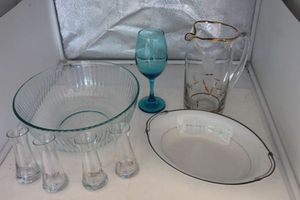 lot 352 image: China Serving Bowl, Vintage Water Pitcher with Tulips and Gold rim, Blue wine glass, punch bowl And Small Glass jars that dont tip