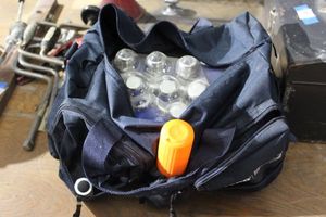 lot 410 image: Car Emergency bag, Flashlights lugnut coves and more