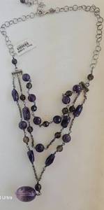 lot 420 image: Jewelry, sterling silver necklace with amethyst-colored beads, necklace stamped J&T .925
