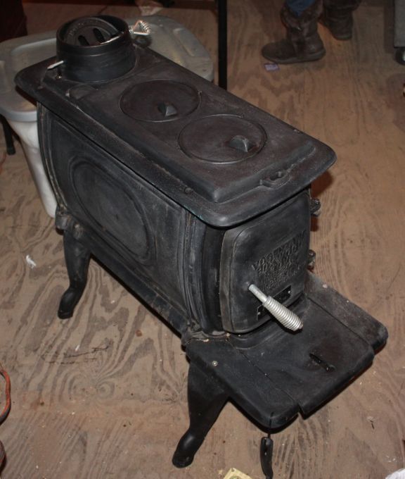 lot 2 image: Cast Iron Wood Burning Stove