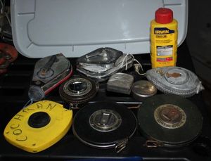 lot 60 image: Variety of Tape Measures, big and small and Chalk Lines
