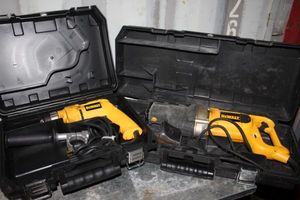 lot 128 image: Dewalt Electric Drill and Reciprocating Saw in Plastic Storage Cases