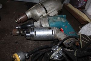 lot 145 image: Makita Corded Drywall Screw Gun, Craftsman Large Heavy Duty 12 inch Drill, and 14 inch hi-Power electric Drill