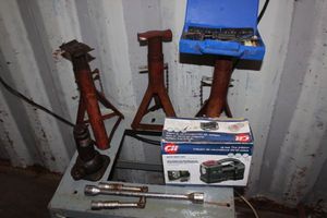lot 202 image: Jack Stands, Bottle Jack Small Compressor Tire repair Kit and Lug Wrench