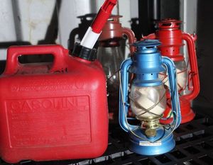 lot 112 image: Three Coleman Fuel Lanterns and Lamp Oil