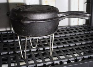 lot 24 image: Cabelas Cast Iron 10D skillet Set