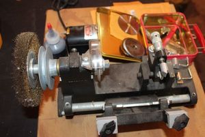 lot 12 image: Foley-Belsaw Model 200 key Cutting Machine with accessories as shown