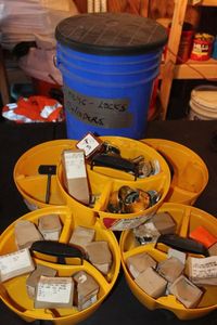 lot 220 image: Five Gallon Bucket Organizer Trays and Bucket, Contents Included, Lock cylinders and Much More