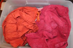 lot 258 image: Tote of Womens SpringSummer Wear, Sizes Large to XXL. Includes Two piece Shirt and Capri outfit, skirts  and More. Comes with Tote