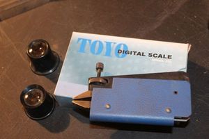 lot 282 image: Jewlers Magnifiers, Scales, and Precision Pliers