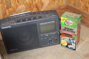 lot 305 image: Multiband Radio and Headlight Restore Kit