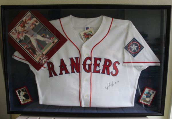 lot 3 image: Jaun Gonzalez Autographed and Framed Rangers Jersey