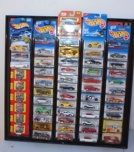 lot 59 image: Display board with collectable Hot Wheels