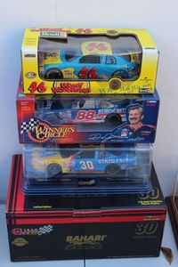 lot 39 image: NASCAR die cast Collectable cars #46 Woody Woodpecker, #88 Dale Jarrett and #30 Bahar Racing Derrick Cope