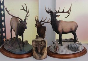 lot 27 image: From Danbury Mint Monarchs of the Wilderness Sculpture collection, by Bruce Miller and Curtis Christensen, Winter Call and The Crossing. Rocky Mountain MCSI 2003