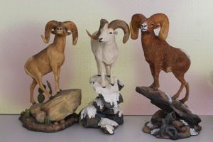 lot 26 image: The Danbury Mint Resign Animals Rock Mountain Bighorn, Dall Sheep and Desert Bighorn all by Nick Bibby