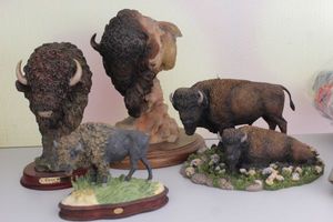 lot 25 image: Bison Resin Figures, The Bison Theodore Roosevelt National Park, Classic Wildlife Collection, On the Range Dan Ingebrigtson The Danbury Mint and Last Battle Mill Creek Studios