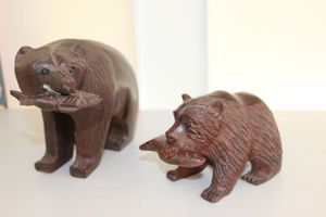 lot 68 image: Two Iron Wood Hand Carved Grizzly Bears with Fish