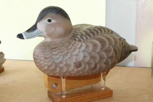 lot 8 image: Beautiful Hand Carved Redhead Decoy Duck on Display Stand