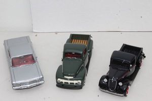 lot 143 image: Danbury Mint 1935 Ford Pick up, Danbury Mint 1951 Ford F-150 Pick up, and Franklin Mint 1963 Chevrolet Impala
