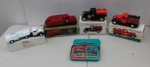 lot 136 image: Die Cast Tanker Trucks, Texaco 1939 Dodge Airflow Die Cast Coin Bank Collector Series #10, 1930 Ford Clarks Super Gas Die-cast Car-Bank, and Liberty Classics Limited Edition 1937 Chevy Tanker