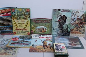 lot 171 image: Vintage Metal Remington Signs