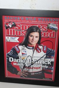 lot 14 image: Sports Illustrated Autographed Cover by Danica Patrick