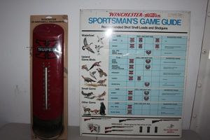 lot 158 image: Vintage Metal Signs, Winchester Game Guide and Thermometer