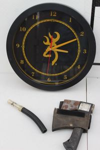 lot 185 image: Realtree Clock, Duck Call, and Hatchet