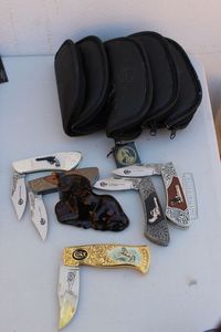lot 203 image: Colt Collectors Knives by Franklin Mint and Vintage Avon Colt Decanter Bottle