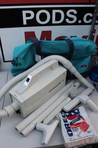 lot 235 image: Vintage Orek Vacuum, accessories, and bag