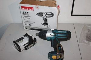 lot 241 image: Makita 18v Impact Wrench and Light, includes 1 battery, no charger, and carry bag