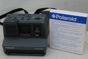 lot 251 image: Polaroid Camera and Film