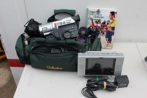 lot 252 image: Sony Camcorder with extra Lenses and carrying case, and RCA Mini Television