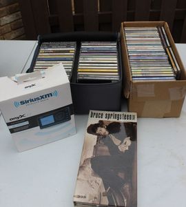 lot 256 image: SiriusXM Radio in Original Box and Selection of CDs
