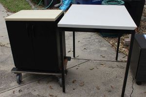 lot 265 image: Locking Cabinet with Shelf, Includes Keys (Furniture Dolly Not Included)&nbsp and Table Approx 3ft Tall