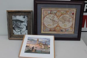 lot 269 image: A Whitefish Point Lighthouse Christmas circa 1920, A New and Accurate of the world, framed, and framed Autographed phot of John Wayne
