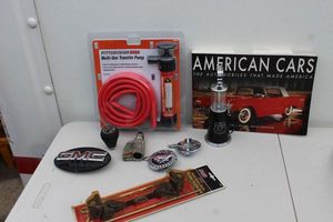 lot 271 image: Mustang and GMC Auto Badges, Sump Pump and more