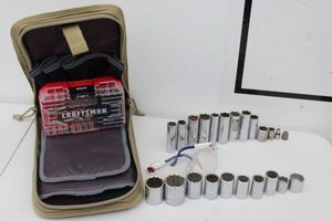 lot 275 image: Sockets, Drill Bit Set, Padded Tool Carrier, and Safety Glasses