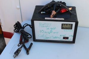 lot 288 image: Battery Charger and Power Cord connects to battery