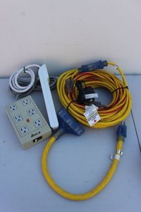 lot 298 image: Two Yellow Heavy-duty Electrical Cords and Heavy Duty Multi Plug with 2 busbars