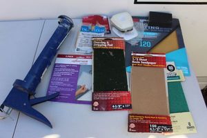 lot 310 image: Variety of Sandpaper and Large Caulking Gun