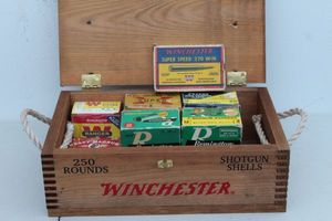 lot 340 image: Winchester Wooden Box and a Box of Winchester 20 Gauge 8 count, Hornadys #5 Turkey&nbsp 10 shothells, Winchester 410Ga 5 Shots, Winchester 270, Peters 12ga 6 shots, Remington 12 Ga , Remington 12 GA Premium Grade 2 boxes
