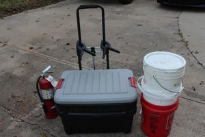 lot 379 image: Portable Fold up Dolly, Rubbermaid Tough Packer Tote, Fire Extinguisher, and 3 Five Gallon Buckets
