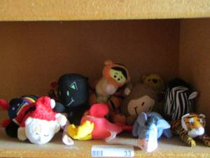 lot 33 image: mini stuffed animals- Winnie the Pooh and Christmas and Halloween