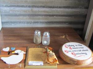 lot 44 image: salt and pepper shakers - wooden wall plaques-