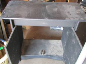 lot 98 image: small black table with front door access